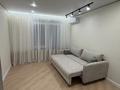 2-бөлмелі пәтер · 52 м² · 15/18 қабат, Жандосова 94/8, бағасы: 52.5 млн ₸ в Алматы, Бостандыкский р-н — фото 2
