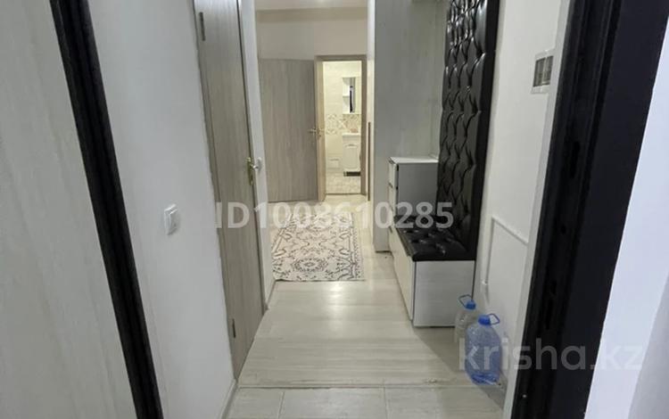 2-комнатная квартира · 64 м² · 6/9 этаж, мкр Нурсая 113 за 180 000 ₸ в Атырау — фото 2