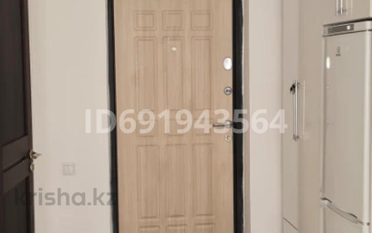 2-комнатная квартира, 33.4 м², 4/5 этаж, мкр Хан Тенгри за 28 млн 〒 в Алматы, Бостандыкский р-н — фото 2