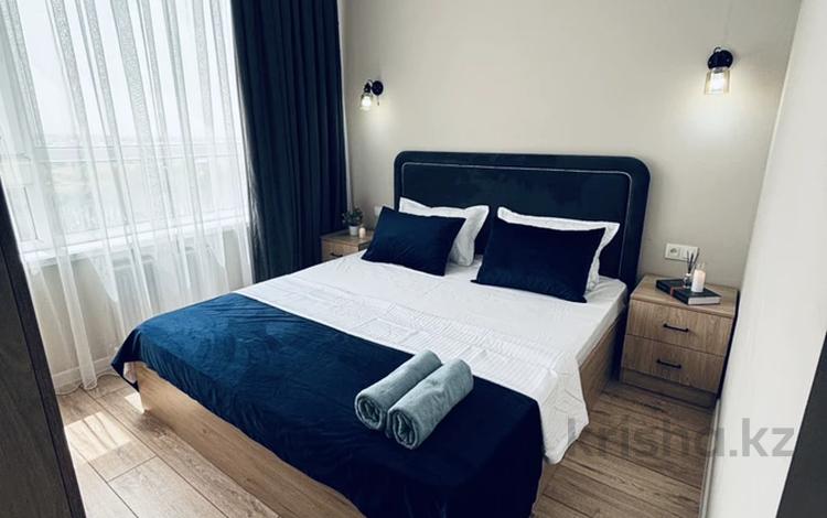 2-бөлмелі пәтер · 52 м² · 15/16 қабат, Сырым батыра 2/30 — GraMaD, бағасы: 18 000 ₸ в Шымкенте — фото 2