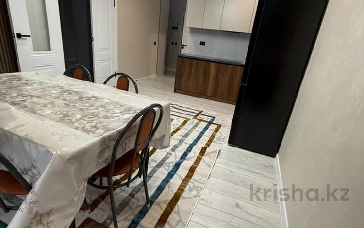 2-комнатная квартира · 54 м² · 2/9 этаж, мкр Думан-2 58 за 260 000 ₸ в Алматы, Медеуский р-н — фото 2