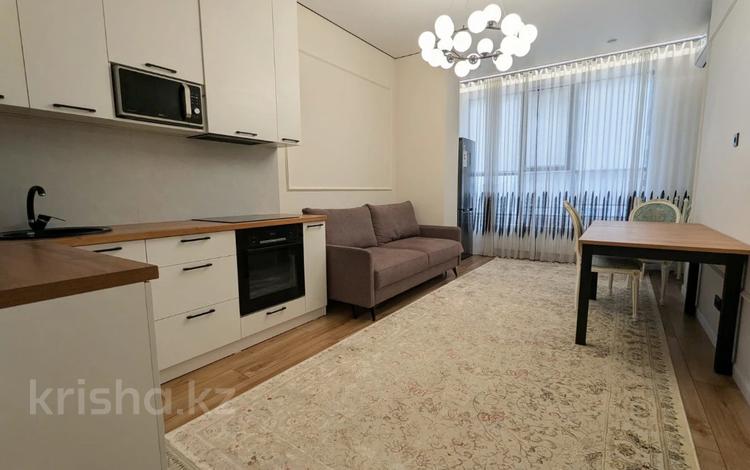 2-комнатная квартира · 50 м² · 5/18 этаж, Тургут Озала за 47 млн ₸ в Алматы, Бостандыкский р-н — фото 2
