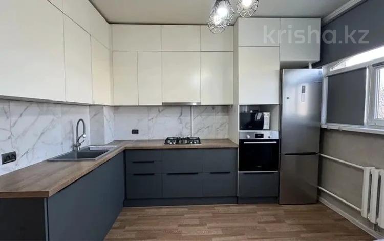 3-комнатная квартира · 73 м² · 5/9 этаж, мкр Аксай-4 за 46.5 млн ₸ в Алматы, Ауэзовский р-н — фото 2