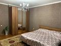 3-комнатная квартира, 104 м², 6/9 этаж посуточно, мкр Аксай-1А за 20 000 〒 в Алматы, Ауэзовский р-н — фото 7