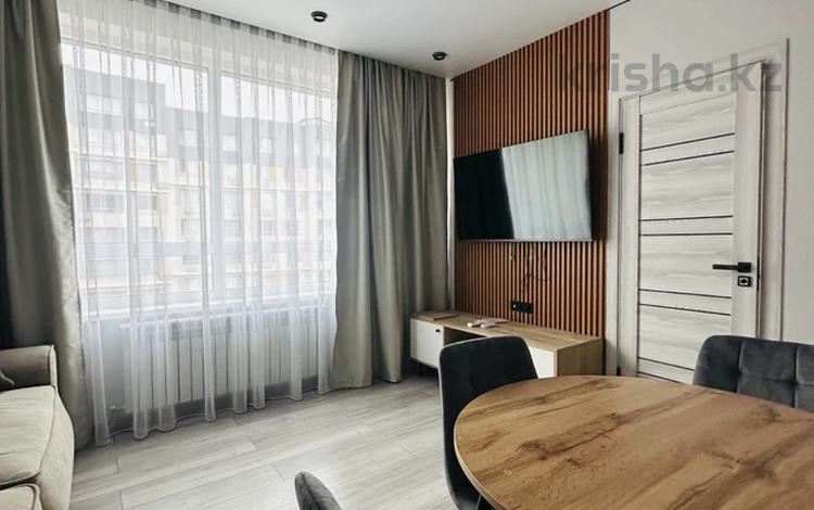 2-комнатная квартира · 57 м² · 12/15 этаж, Утепова 31 за 350 000 ₸ в Алматы, Бостандыкский р-н — фото 2