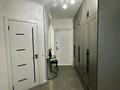 3-комнатная квартира · 105 м² · 7/9 этаж, мкр Аксай-1А за 60 млн ₸ в Алматы, Ауэзовский р-н — фото 6