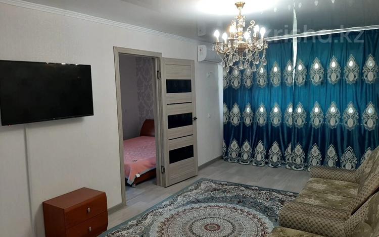 2-комнатная квартира, 50 м², 4/4 этаж посуточно, Биржан сал 89 за 9 000 〒 в Талдыкоргане — фото 2
