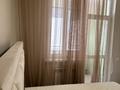 2-комнатная квартира · 60 м² · 8/8 этаж, Кабанбай батыра 58А за 350 000 ₸ в Астане, Есильский р-н — фото 4