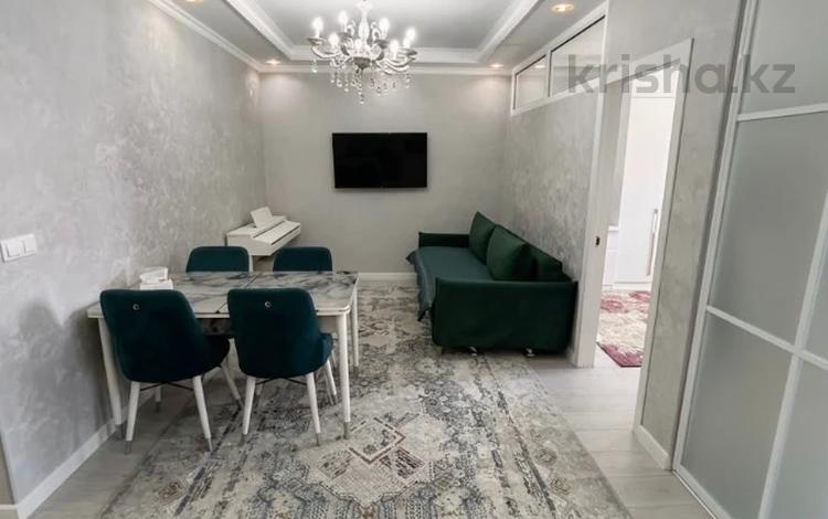 3-комнатная квартира · 56 м² · 10/10 этаж, Мкр Аксай, Б. Момышулы 25 за 39 млн ₸ в Алматы, Ауэзовский р-н — фото 2