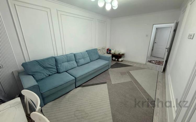 2-комнатная квартира · 52 м² · 2/5 этаж, мкр Аксай-4 за 44 млн ₸ в Алматы, Ауэзовский р-н — фото 2