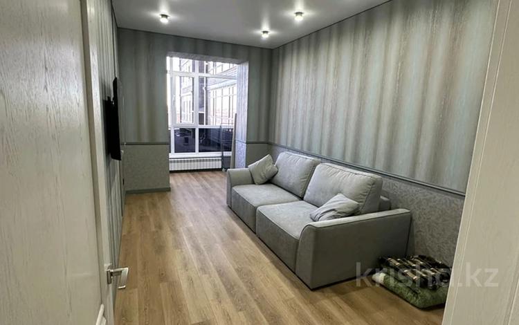 1-комнатная квартира · 56 м² · 1/9 этаж, Самал 72/4 за 24.5 млн 〒 в Уральске — фото 2