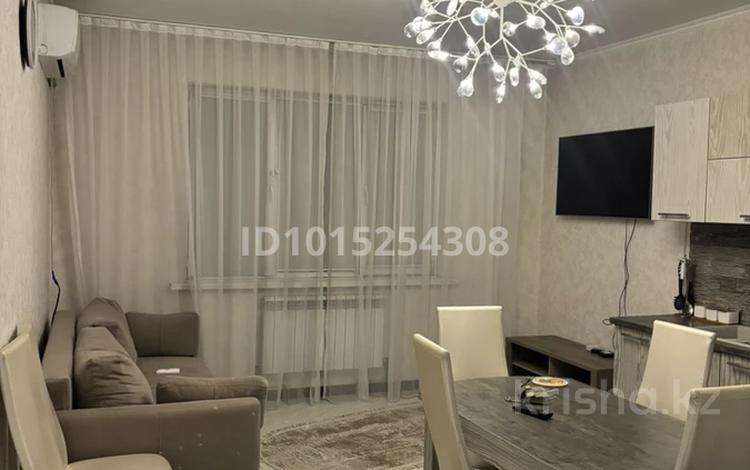 2-комнатная квартира · 60 м² · 5/16 этаж, Торайгырова 19а за 370 000 ₸ в Алматы, Бостандыкский р-н — фото 2