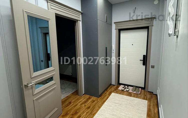 2-комнатная квартира · 58 м² · 4/9 этаж, мкр Шымсити, Байдибек би 10/3 за 300 000 ₸ в Шымкенте, Абайский р-н — фото 2