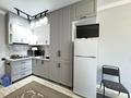 1-комнатная квартира · 40 м² · 6/6 этаж, мкр Нуркент 8 за 235 000 ₸ в Алматы, Алатауский р-н — фото 11