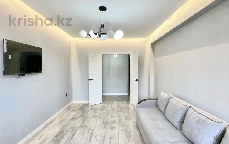 2-комнатная квартира · 75 м² · 10/13 этаж, Толе би 189/3 за 64 млн ₸ в Алматы, Алмалинский р-н — фото 26
