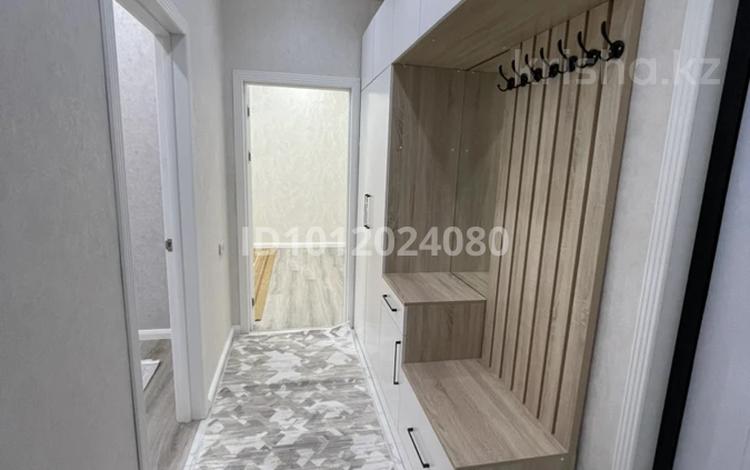 2-комнатная квартира · 60 м² · 3/9 этаж, Байдибек би 126/6 за 220 000 ₸ в Шымкенте, Каратауский р-н — фото 2