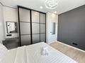 2-бөлмелі пәтер · 55 м² · 12/15 қабат, Райымбека 210/7, бағасы: 25 000 ₸ в Алматы, Алмалинский р-н — фото 4