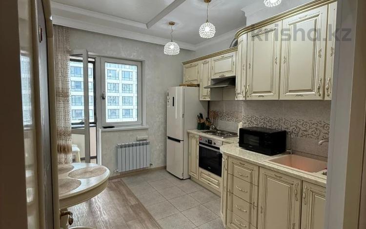 2-комнатная квартира · 74 м² · 4/10 этаж, Абикена Бектурова 1/1 за 400 000 ₸ в Астане, Есильский р-н — фото 2