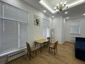 2-комнатная квартира · 54 м² · 1/12 этаж, 14-й мкр 2/1 — Сзади торговый комплекс Астана за 35 млн ₸ в Актау — фото 71