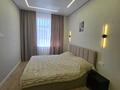 2-комнатная квартира · 60 м² · 15/17 этаж, мкр Юго-Восток, Букетова 3/2 Блок А — ЖК ,,Атамура,, рядом с World Class за 20 000 ₸ в Караганде, Казыбек би р-н — фото 13