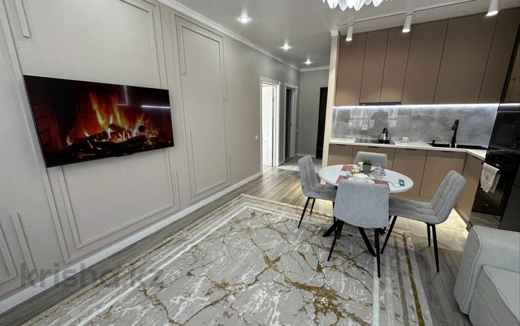 2-комнатная квартира · 56 м² · 13 этаж, Утепова 31 за 350 000 ₸ в Алматы, Бостандыкский р-н — фото 2