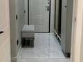 3-комнатная квартира · 70.2 м² · 9/9 этаж, мкр Аксай-4 57 за 57 млн ₸ в Алматы, Ауэзовский р-н — фото 21