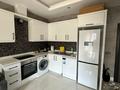 2-бөлмелі пәтер · 55 м² · 4/5 қабат, Каргыджак, ул. 274, бағасы: 450 000 〒 в Аланье — фото 6