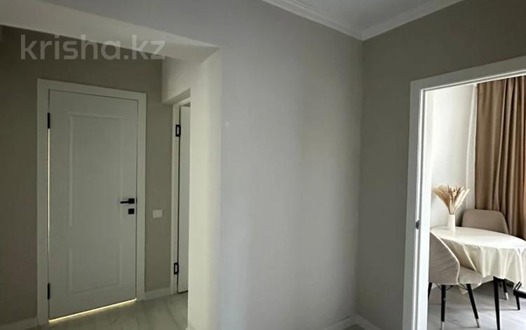 2-комнатная квартира · 52 м² · 3/5 этаж, жарокова 292 за 52.5 млн ₸ в Алматы, Бостандыкский р-н — фото 2