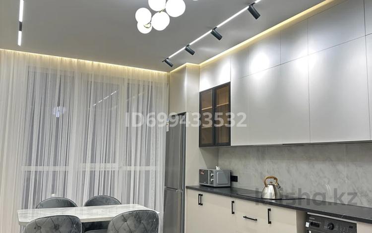 2-комнатная квартира · 76 м² · 11/12 этаж, мкр Шапагат , Аргынбекова 18б — Шаяхметова за 400 000 〒 в Шымкенте, Каратауский р-н — фото 2