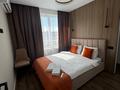 1-комнатная квартира · 55 м², Жандосова за 22 500 〒 в Алматы, Бостандыкский р-н — фото 2