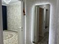 3-бөлмелі пәтер · 69.5 м² · 1/5 қабат, 26-ш/а. 2, бағасы: 25 млн ₸ в Актау, 26-й мкр — фото 11