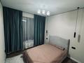 2-комнатная квартира · 45 м² · 6/7 этаж, мкр Томирис, Рыскулова 103/6 за 320 000 ₸ в Алматы, Алатауский р-н — фото 10