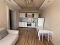 2-комнатная квартира · 45 м² · 11/12 этаж, Валиханова 1 за 23.5 млн ₸ в Астане, р-н Байконур — фото 2