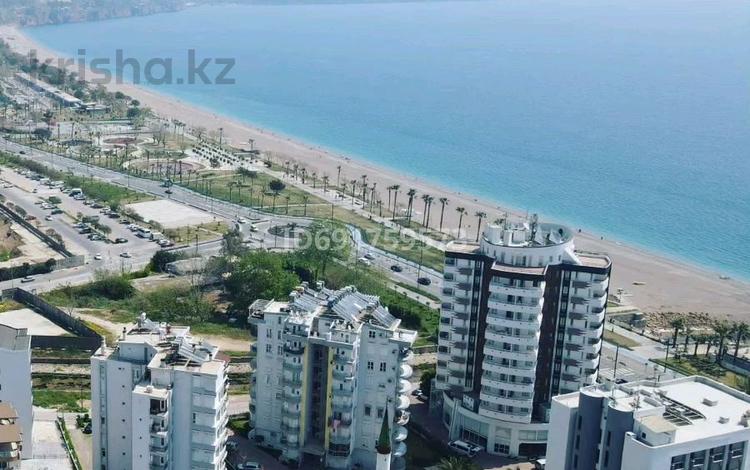 2-комнатная квартира, 100 м², Konyaaltı — Спальный район в локации ТРЦ Мигрос 5, Луна Парк, пляж за 290 млн 〒 в Анталье — фото 2