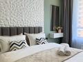 2-комнатная квартира · 50 м², Кабанбай батыра 58б за 17 800 ₸ в Астане, Есильский р-н — фото 2