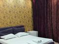 2-комнатная квартира, 100 м², 25/30 этаж посуточно, Аль-Фараби 7 за 25 000 〒 в Алматы, Бостандыкский р-н — фото 3