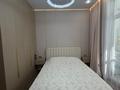 2-комнатная квартира · 47 м² · 5/9 этаж, мкр Уркер, Е-899 5 за 45 млн ₸ в Астане, Нура р-н — фото 12