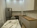 2-комнатная квартира · 55.6 м² · 5/9 этаж, Толе би 65 за 56 млн ₸ в Астане, Нура р-н — фото 11