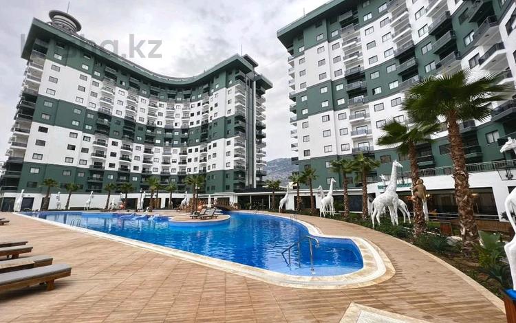 2-бөлмелі пәтер · 55 м² · 8/10 қабат, Сиренити 7 — Махмутлар, бағасы: 78.5 млн 〒 в Аланье — фото 2