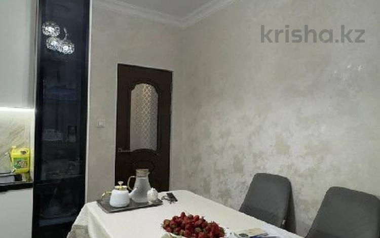 2-комнатная квартира · 60 м² · 3/9 этаж, мкр Аксай-1 за 43 млн ₸ в Алматы, Ауэзовский р-н — фото 12