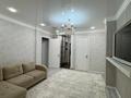 4-комнатная квартира · 125 м² · 10/12 этаж, Кабанбай батыра 42 за 66 млн 〒 в Астане, Есильский р-н — фото 11