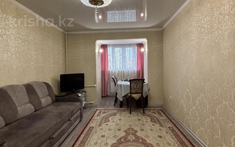 3-комнатная квартира · 63 м² · 4/5 этаж, Касыма Аманжолова 71А за 29 млн ₸ в Караганде, Казыбек би р-н — фото 2