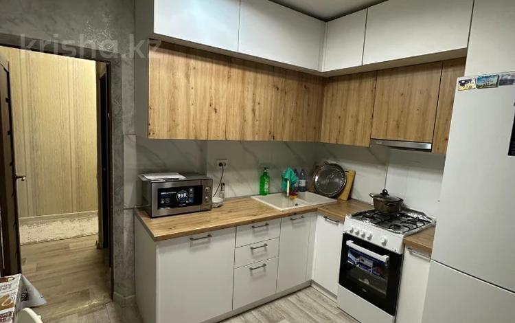 2-комнатная квартира · 50.7 м² · 9/9 этаж, мкр Аксай-1А — Саина за 35 млн ₸ в Алматы, Ауэзовский р-н — фото 3
