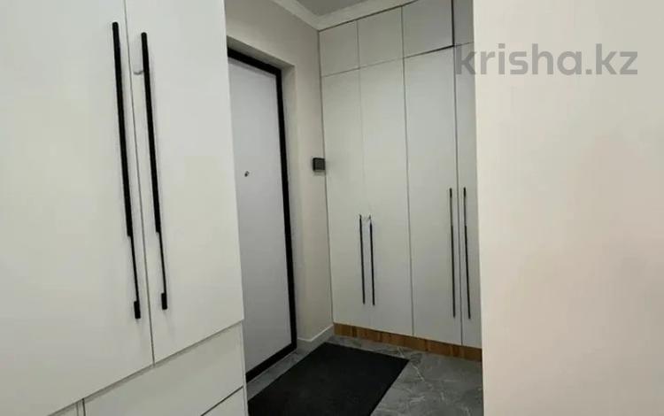2-комнатная квартира · 58 м² · 11/16 этаж, Розыбакиева 197/2 за 75 млн ₸ в Алматы, Бостандыкский р-н — фото 2