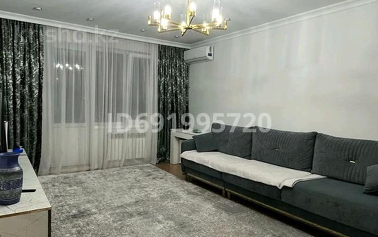 3-комнатная квартира, 103 м², 9/9 этаж, мкр Аксай-1А 22 за 60 млн 〒 в Алматы, Ауэзовский р-н — фото 2
