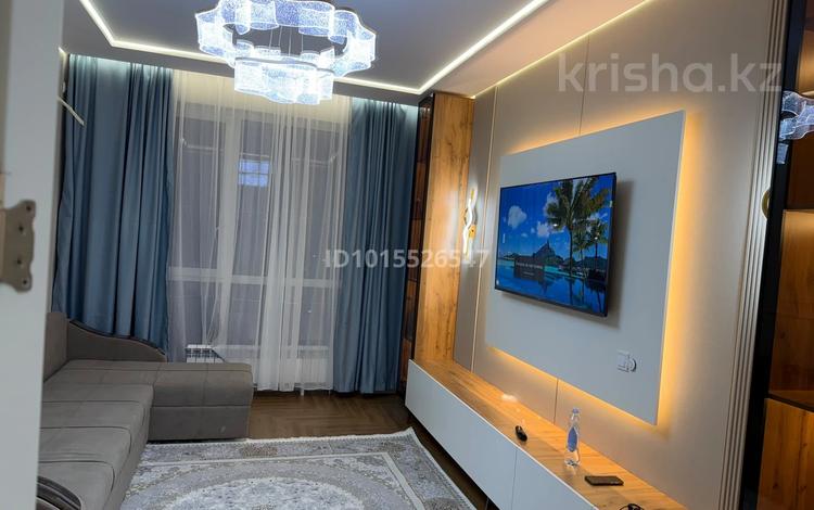 2-комнатная квартира · 65 м² · 3/9 этаж, мкр Нуркент — Рысқулова Момышұлы за 350 000 ₸ в Алматы, Алатауский р-н — фото 2