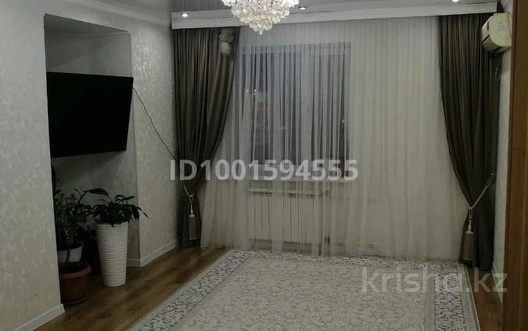 3-комнатная квартира · 70 м² · 3/5 этаж, мкр 11 за 28 млн 〒 в Актобе — фото 2