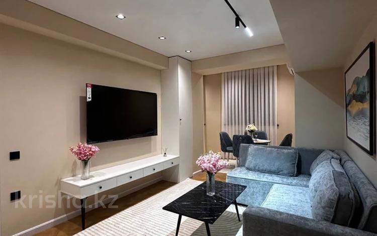 2-комнатная квартира · 56 м² · 8/17 этаж, Толе би 185А за 400 000 ₸ в Алматы, Алмалинский р-н — фото 2