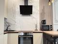 3-бөлмелі пәтер · 74 м² · 4/13 қабат, Досмухамедова 79 — А 98, бағасы: 89.9 млн ₸ в Алматы, Алмалинский р-н — фото 14