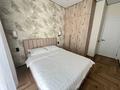 2-комнатная квартира · 50 м² · 13/18 этаж, Сыганак 4 за 18 000 ₸ в Астане, Нура р-н — фото 4